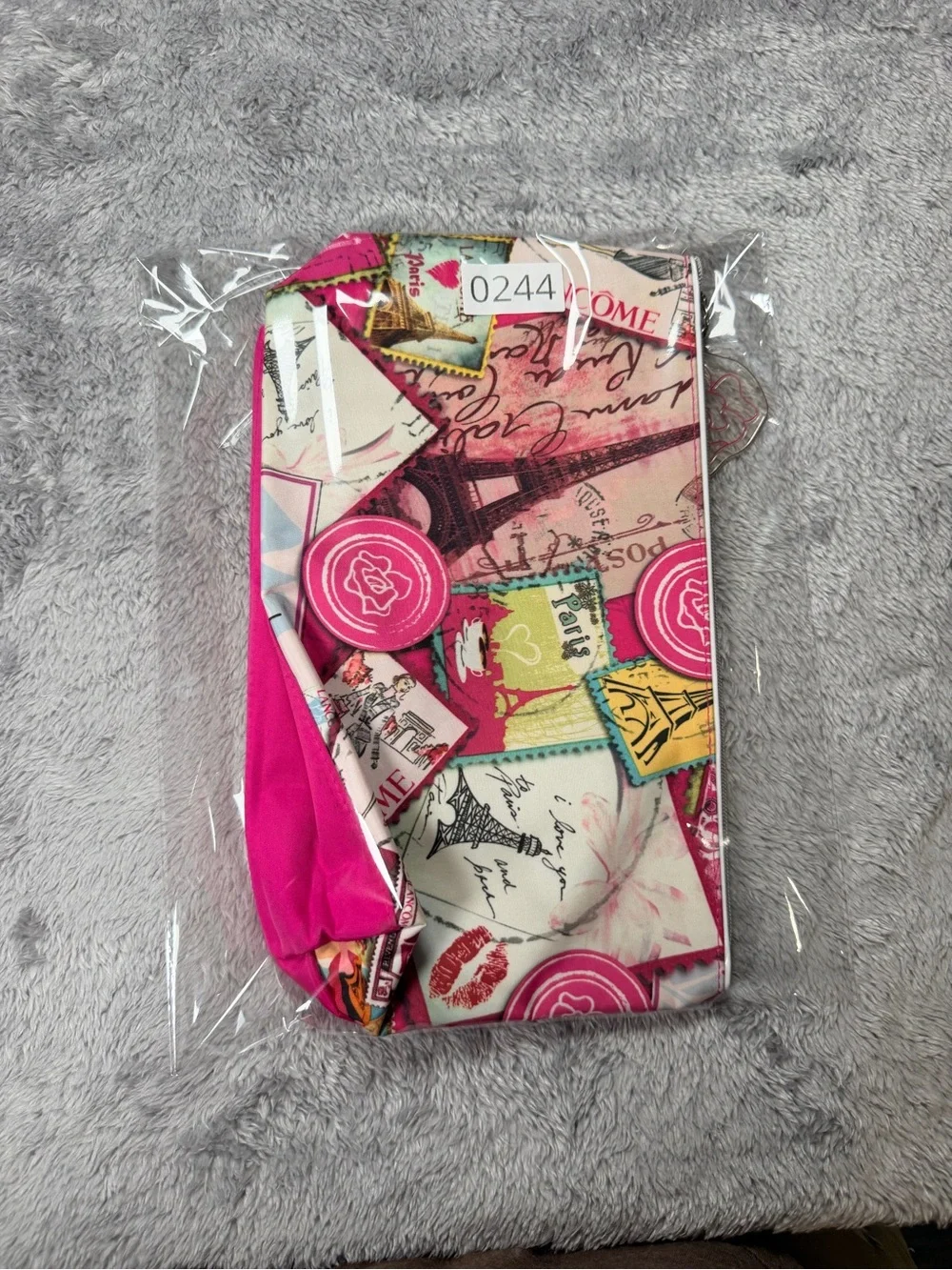 Lancome Pink and Fuchsia Paris Print Wristlet